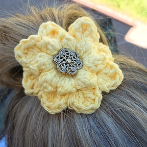 Hand crocheted flower ponytail band/hair accessory in yellow cotton with antique gold button