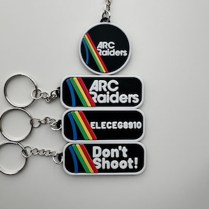 Llavero retro de ciencia ficción: un emblema creado por fans para gamers | Personalizable | Accesorio con logo futurista