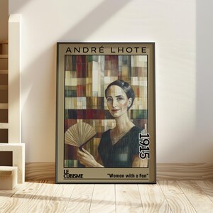 May include: A framed art print displaying a portrait of a woman with a fan, with the text "ANDRÉ LHOTE" at the top. The artwork is titled "Woman with a Fan" and includes the year 1915. The background features a cubist design.