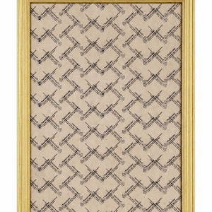 May include: A rectangular picture frame with a metallic gold finish. The interior is filled with a light tan protective sheet featuring a repeating black pattern of diagonal lines, small triangle warning icons, and the word Reminder.