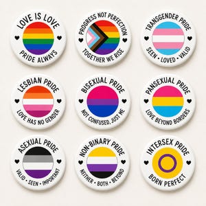 May include: Nine circular white buttons featuring various pride flags and black text. The buttons display phrases like Love Is Love, Progress Not Perfection, Transgender Pride, Lesbian Pride, Bisexual Pride, Pansexual Pride, Asexual Pride, Non-Binary Pride, and Intersex Pride.