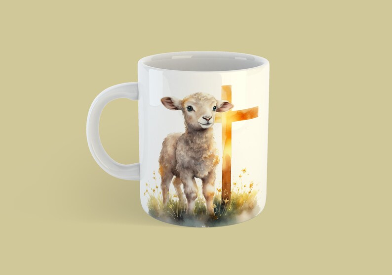 May include: White ceramic mug with a watercolor illustration of a lamb standing in front of a golden cross. The background is a watercolor wash of yellow and orange.