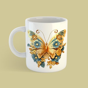 May include: White ceramic mug featuring a gold and blue butterfly design. The butterfly is surrounded by flowers and leaves.