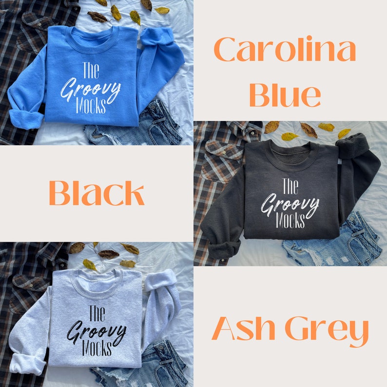 May include: A collage of three sweatshirts in different colours: Carolina Blue, Black, and Ash Grey. Each sweatshirt features the text "The Groovy Mocks" printed on the front.