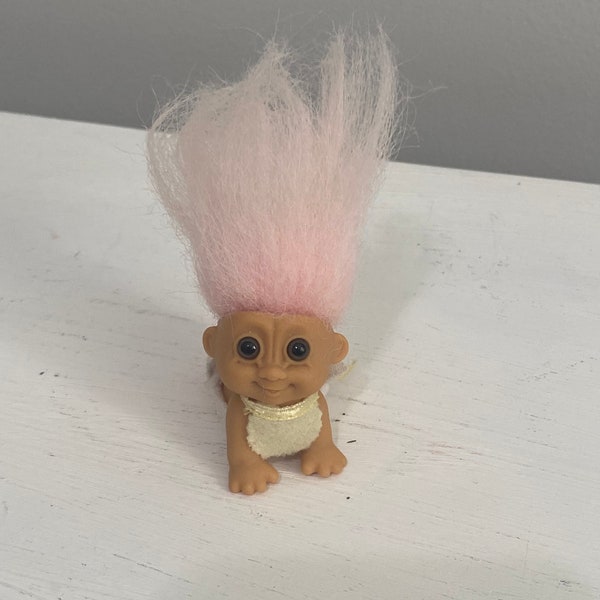 Vintage small crawling troll doll with pink hair, bib and diaper