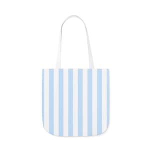 May include: A tote bag with a vertical striped pattern in light blue and white. The bag has white handles and is set against a white background. The bag is designed for carrying items.