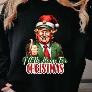 トランプ「クリスマスには家に帰るよ」スウェットシャツ、ユーモラスなトランプのクリスマス T シャツ、クリスマス共和党セーター、クリスマスサンタトランプシャツ