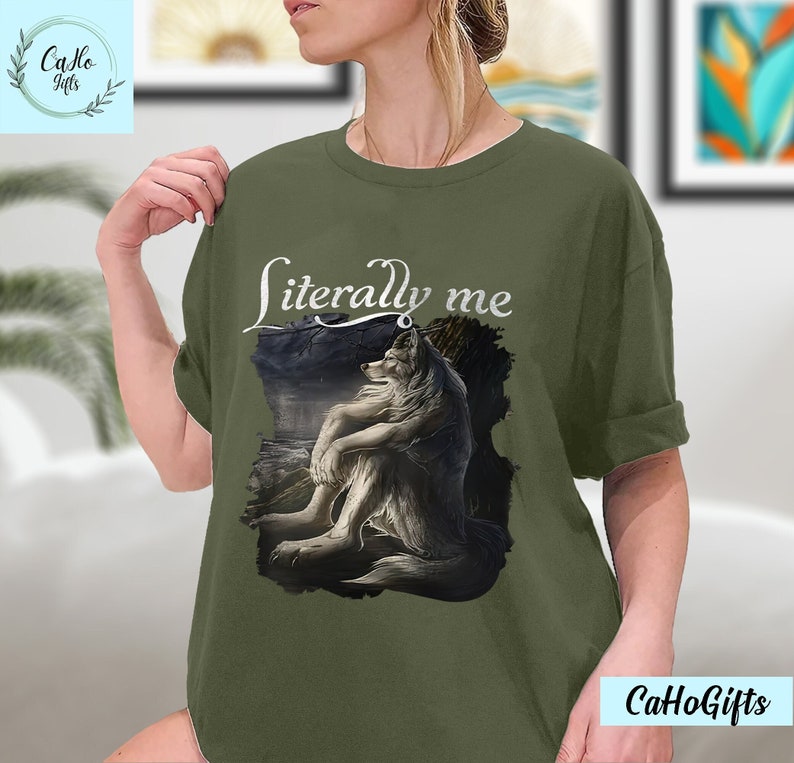 May include: A green t-shirt with the text "literally me" printed in white. A gray wolf illustration is centered on the shirt.