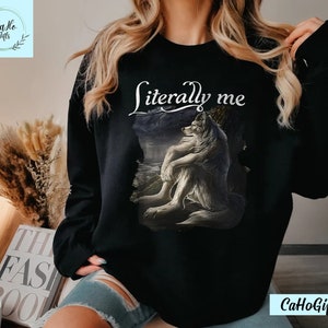 May include: Black sweatshirt with a white wolf graphic and the text "literally me" printed on the front.