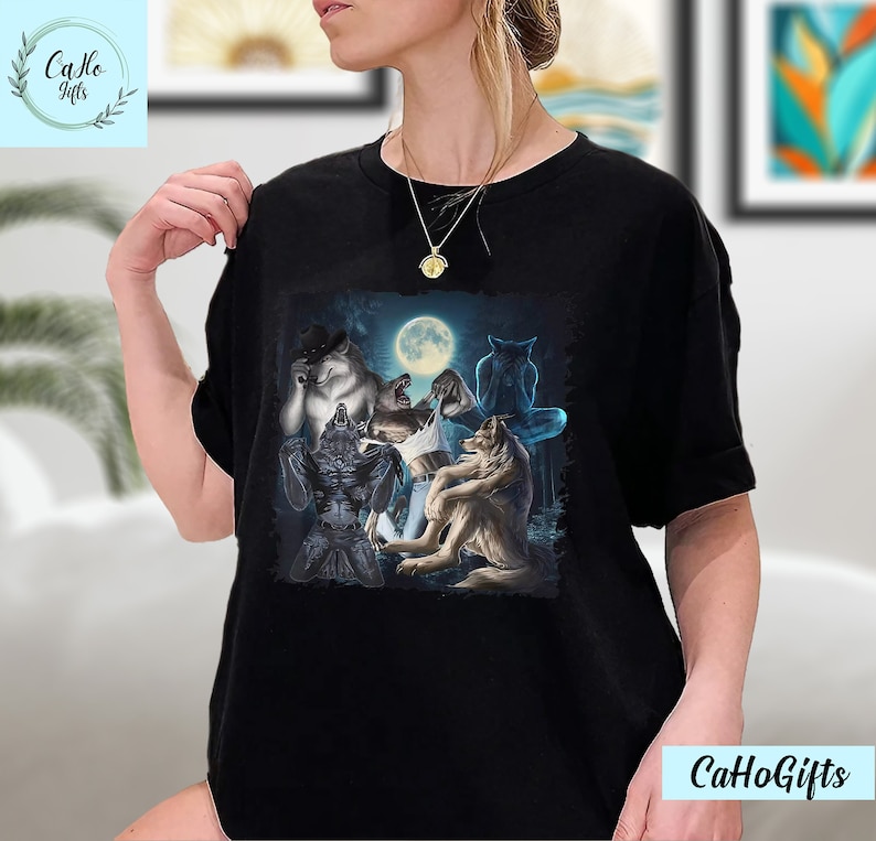 May include: Black t-shirt with a graphic print of five wolves howling at the moon. The wolves are in a dark forest setting.