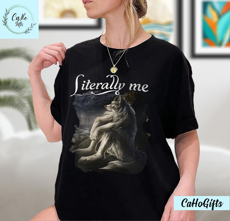 May include: Black t-shirt with a white wolf graphic and the text "literally me".