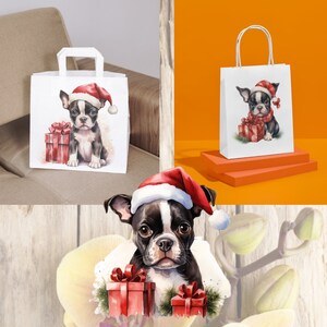 May include: A white gift bag with a black and white Boston Terrier puppy wearing a red Santa hat and holding a red gift box. The bag has a red and white striped handle.