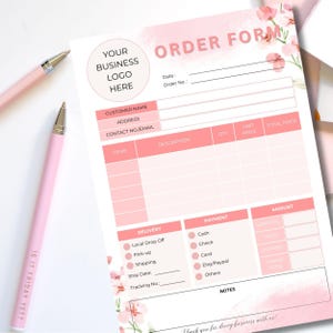 May include: Pink order form with floral design. The form includes sections for customer information, items, delivery, payment, and notes. It also has a space for a business logo.