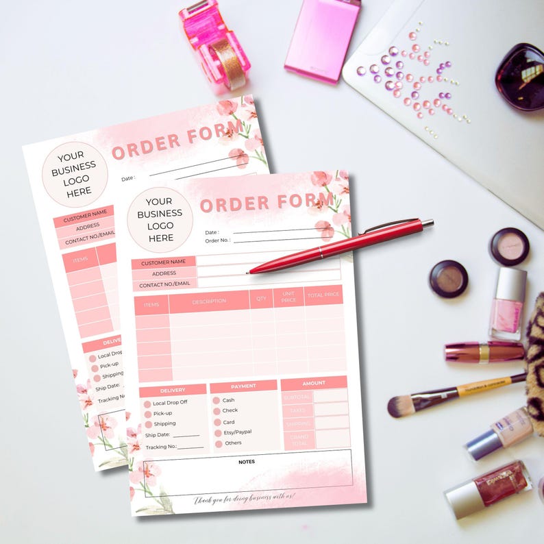May include: Two pink order forms with floral designs. The forms have sections for customer information, delivery, payment, and amount. The text on the form says "Order Form".