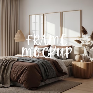 May include: A bedroom interior with a bed featuring brown bedding, pillows, and a gray blanket. Three framed art pieces hang above the bed. A woven pendant light and a wooden side table with a lamp and vase complete the scene. The text "FRAME MOCKUP" is overlaid on the image.
