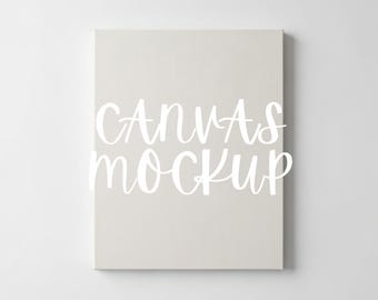 Könnte beinhalten: Ein rechteckiger Leinwand-Mockup in neutraler Beige-Farbe, zentriert vor einem weißen Hintergrund. Die Worte "CANVAS MOCKUP" sind in weißer Schreibschrift über die Leinwand geschrieben.