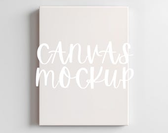 Könnte beinhalten: Ein rechteckiger Leinwand-Mockup in einem neutralen Off-White-Ton. Die Worte "CANVAS mockup" sind in einer Schreibschrift über die Leinwand geschrieben. Die Leinwand ist auf einem schlichten weißen Hintergrund zentriert.