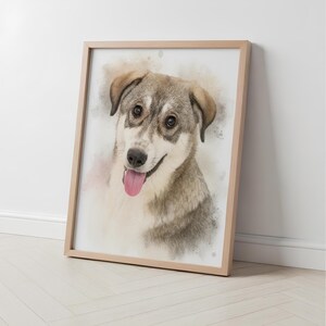 May include: A framed watercolour portrait of a dog. The dog has brown and grey fur and a pink tongue. The artwork is displayed on a white wall and floor, with a wooden frame.