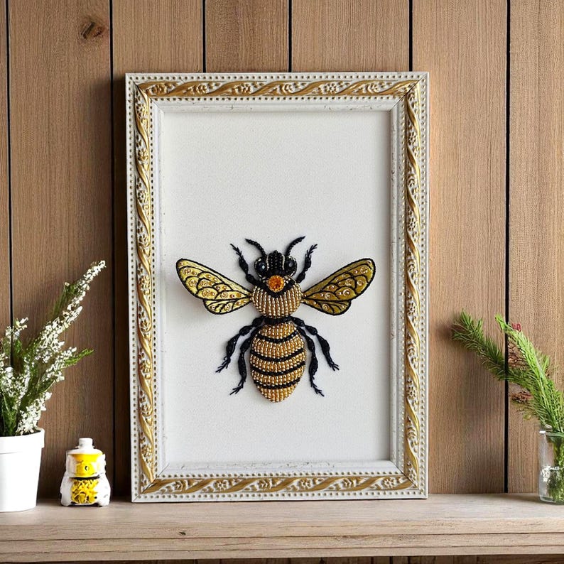 Textured honey bee embroidery showcased in minimalist home decor style