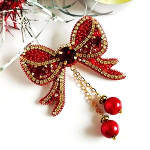 Ribbon bow pin Cristmas brooch Beaded winters dangling brooch with perals new years gift handcrafted ornament Holiday jewelry gifts.