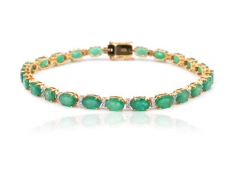 ザンビア産エメラルドペアカットリング：ダイヤモンド18Kホワイト