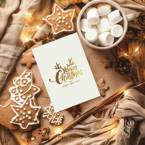 Christmas card mockup flatlay with pinecones and ornaments
5x7 greeting card mockup styled with holiday props
Holiday card mockup bundle with 12 festive scenes
PSD smart object card mockup with neutral Christmas décor
Canva-compatible PNG mockup of holiday card
Christmas stationery mockup with cozy winter background
Seasonal card flatlay with soft lighting and decorations