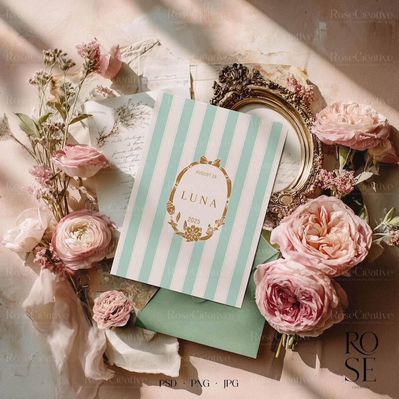 Romantic fine art wedding mockup flatlay with pink roses, vintage golden frame, green envelope and sunlight — elegant floral scene for stationery designs.