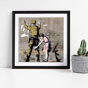 Banksy soldier girl