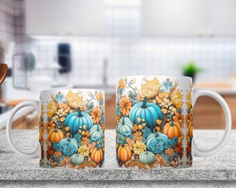 May include: Two white ceramic mugs with a fall-themed design. The mugs feature a blue, orange, and yellow floral pattern with pumpkins.