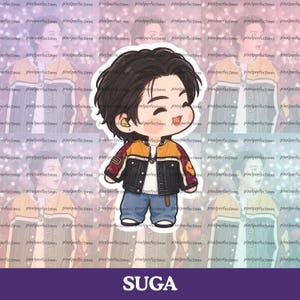 May include: A die-cut sticker featuring a chibi-style illustration of a person with dark hair, wearing a color-blocked jacket in orange, black, and maroon, a white shirt, and blue jeans. The character has a smiling expression and a yellow earring.