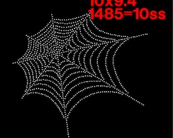 May include: A white spider web design made of rhinestones on a black background. The design is 10 inches by 9.4 inches and requires 1485 rhinestones in size 10ss.