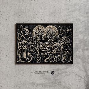 May include: A framed black and white linocut print featuring a surreal, detailed illustration of grotesque figures and creatures. The artwork includes the text "MINDMELDMAGIC linocut collection" at the bottom. The print is displayed against a textured gray wall.