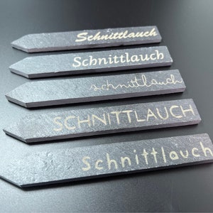 Plant sign lasered out of slate