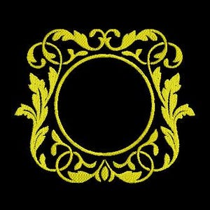 May include: A yellow embroidered design on a black background. The design features a central oval shape surrounded by an ornate, square frame with floral and scroll elements. The overall aesthetic is classic and decorative.