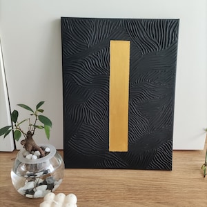 pittura strutturata nera e oro