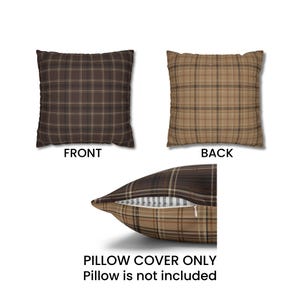 May include: A brown and tan plaid pillow cover with a zipper closure. The front of the pillow cover has a larger brown plaid pattern, while the back has a smaller tan plaid pattern. The pillow cover is shown with the zipper open, revealing the inside of the pillow cover. The text "PILLOW COVER ONLY Pillow is not included" is printed below the pillow cover.