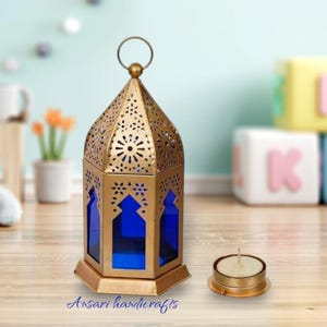 Buy medium Moroccan lantern/candle holder with clear glass and antique metal, artisanal shape outdoor decor