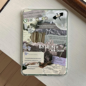 May include: Clear phone case with a collage design featuring the word "Violence", a dragon silhouette, and text from the book "Fourth Wing". The case includes a ticket that says "Riders Quadrant".