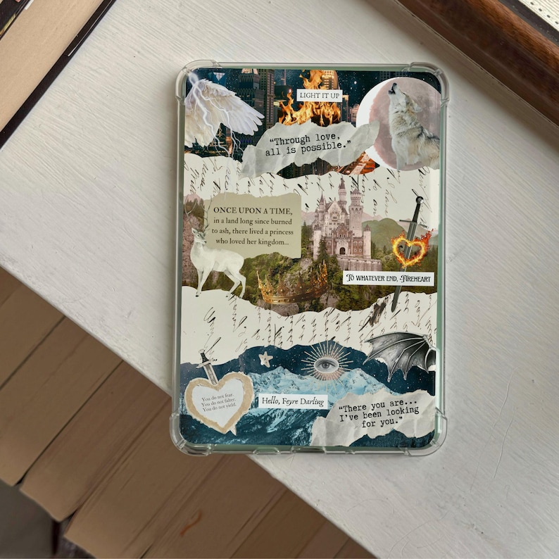 May include: A rectangular clear phone case featuring a collage of fantasy-themed imagery including a castle, a white deer, a wolf, a sword, and wings. Text snippets include "Through love, all is possible," "Once upon a time," and "Hello, Feyre Darling."