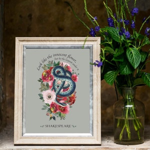 May include: A framed print featuring a watercolour illustration of a snake curled around pink and red flowers. The text "Look like the innocent flower, but be the serpent under it." and "SHAKESPEARE" are printed below the illustration.