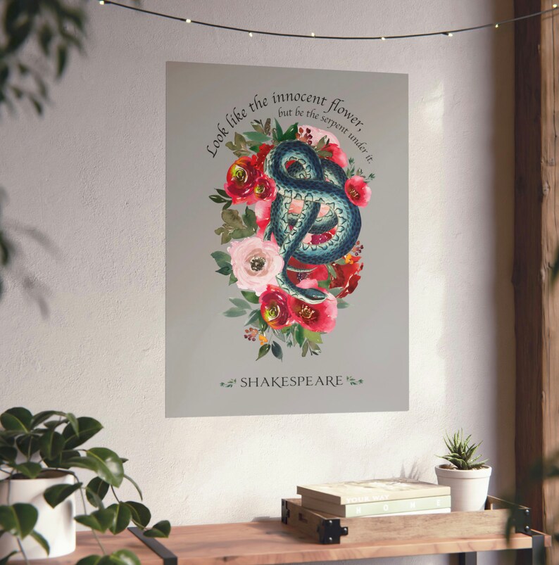 May include: A watercolour illustration of a snake curled up in a bouquet of red, pink and white flowers. The text "Look like the innocent flower, but be the serpent under it." is written above the snake and flowers. The text "SHAKESPEARE" is written below the snake and flowers.