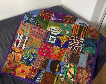 African wax fabric patchwork quilt- lap quilt, chair throw cot, bed, buggy , play mat,  wall hanging Ankara