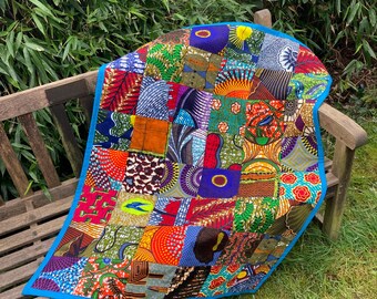 Edredón de patchwork con estampado africano de cera: edredón hecho a mano para el regazo, decoración colorida para el hogar.