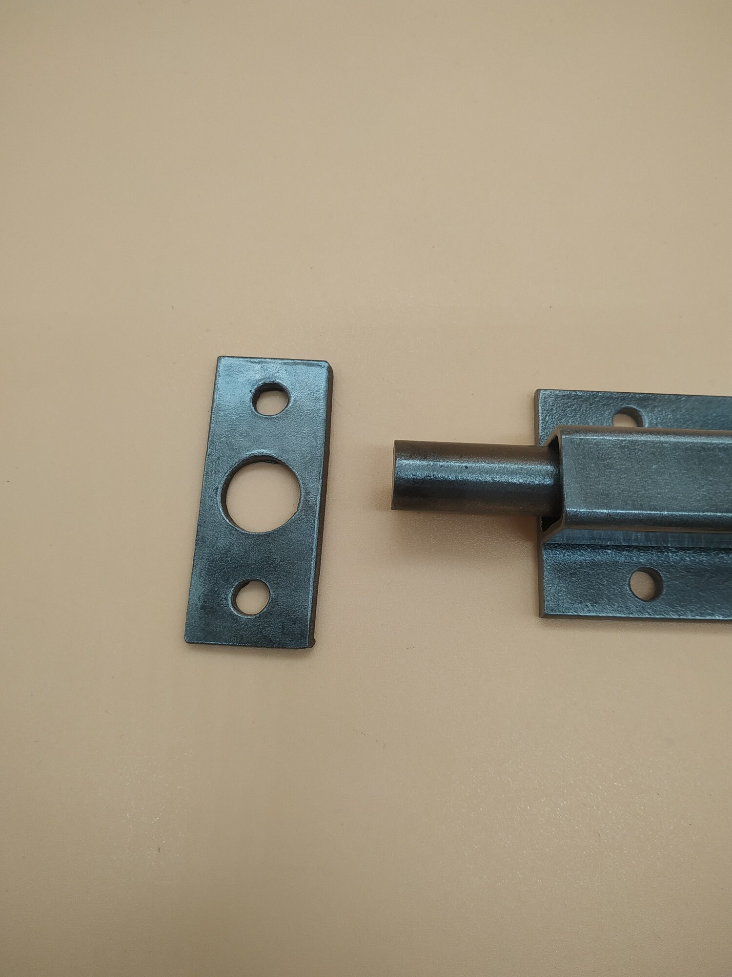 An Industrial Door Latch, Made From Steel in a Rural Style, Ensures