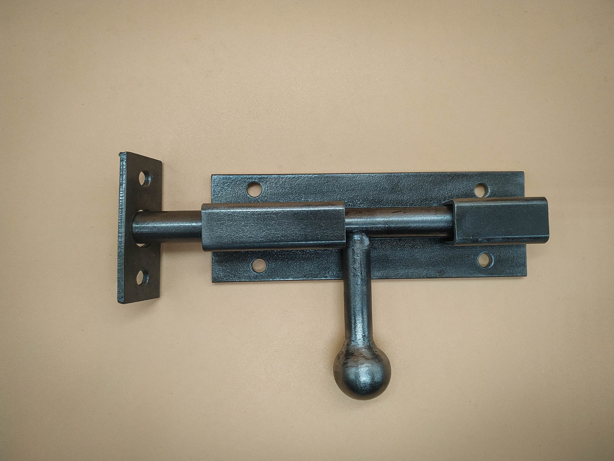 An Industrial Door Latch, Made From Steel in a Rural Style, Ensures