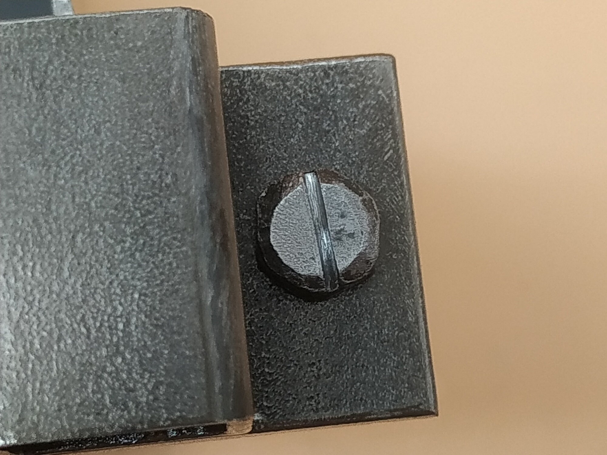 An Industrial Door Latch, Made From Steel in a Rural Style, Ensures