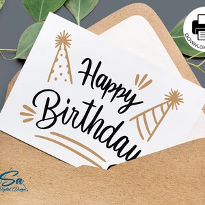 May include: A printable card with the text "Happy Birthday" in black script font with two gold party hats. The card is on a brown envelope.