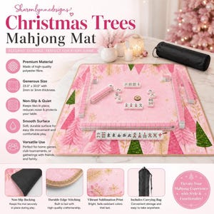 May include: A square Mahjong mat featuring a pink background with a pattern of pink and green Christmas trees and gold foliage. The mat includes a set of Mahjong tiles arranged on the surface and a black carrying bag. It measures 33.0 inches by 33.0 inches.