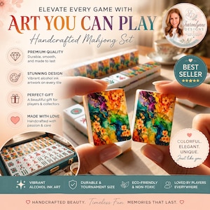 May include: A handcrafted Mahjong set featuring tiles with vibrant, multi-colored alcohol ink floral artwork. The set includes a storage case filled with tiles, and two individual tiles are displayed showing detailed orange, purple, and teal patterns.