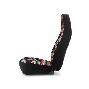 A car seat cover with a colorful geometric pattern on the front and black on the sides, viewed from the right side on a white background.